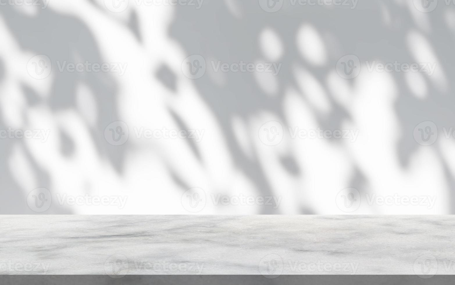 Marble table with tree shadow drop on white wall background for mockup product display photo