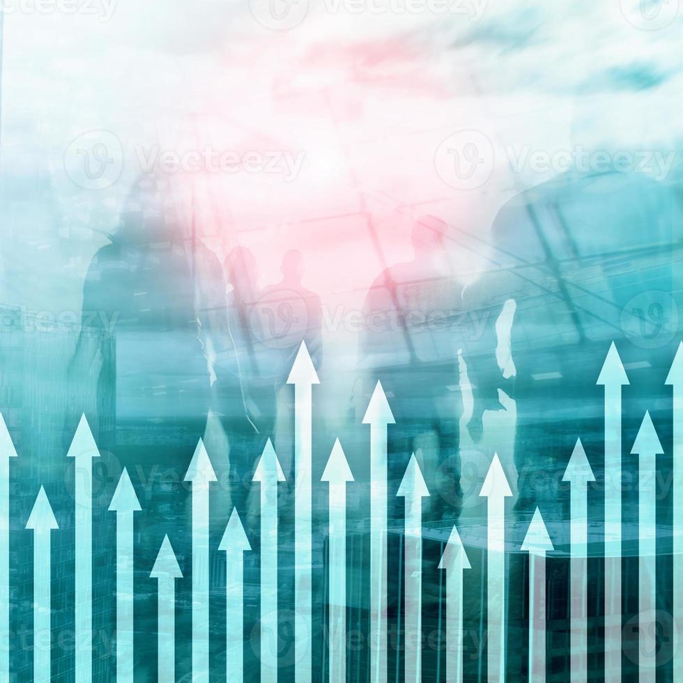 Up arrow graph on skyscraper background. Invesment and financial growth concept. photo