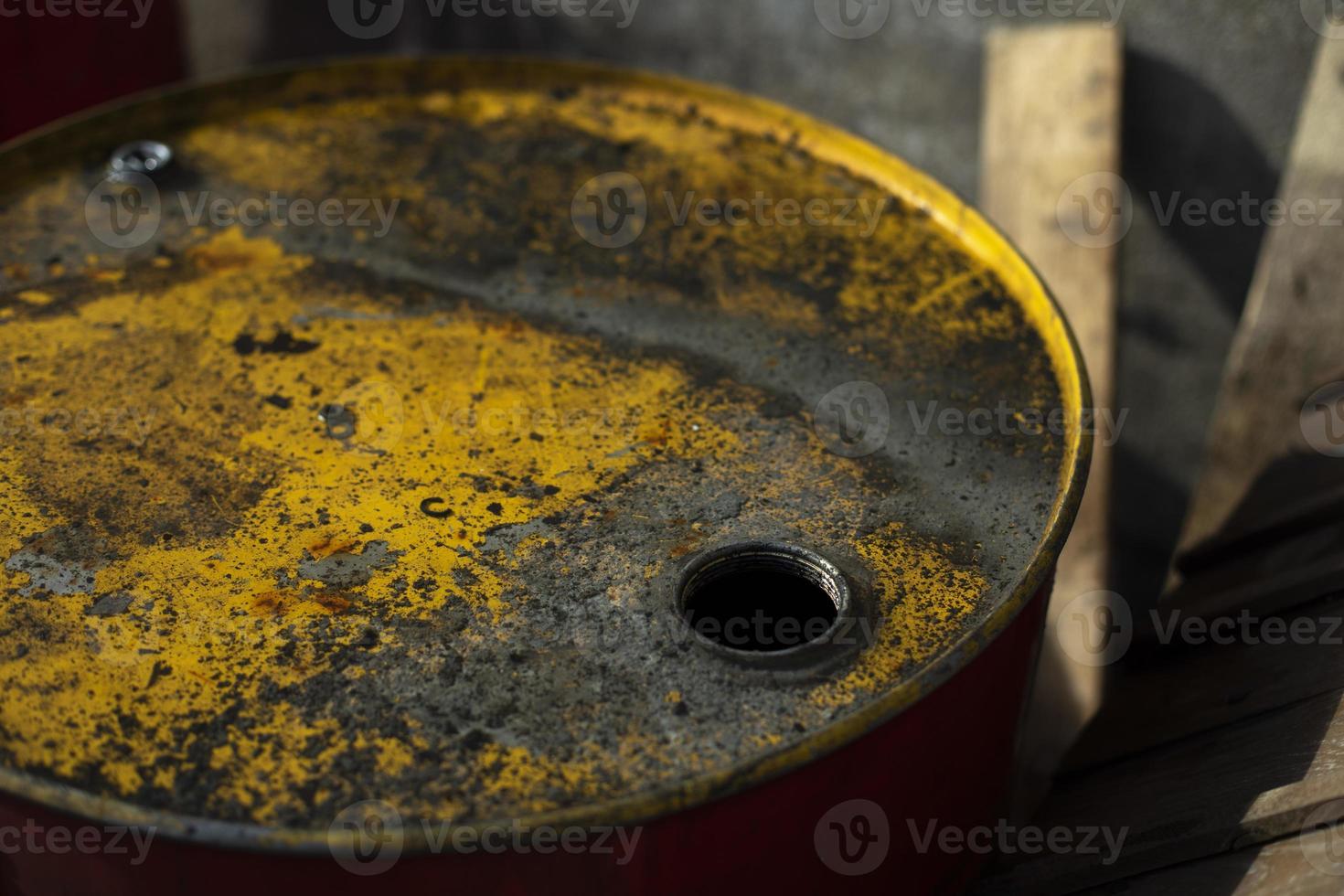 Fuel tank and rust. Steel barrel on street. Hole for receiving fuel. photo