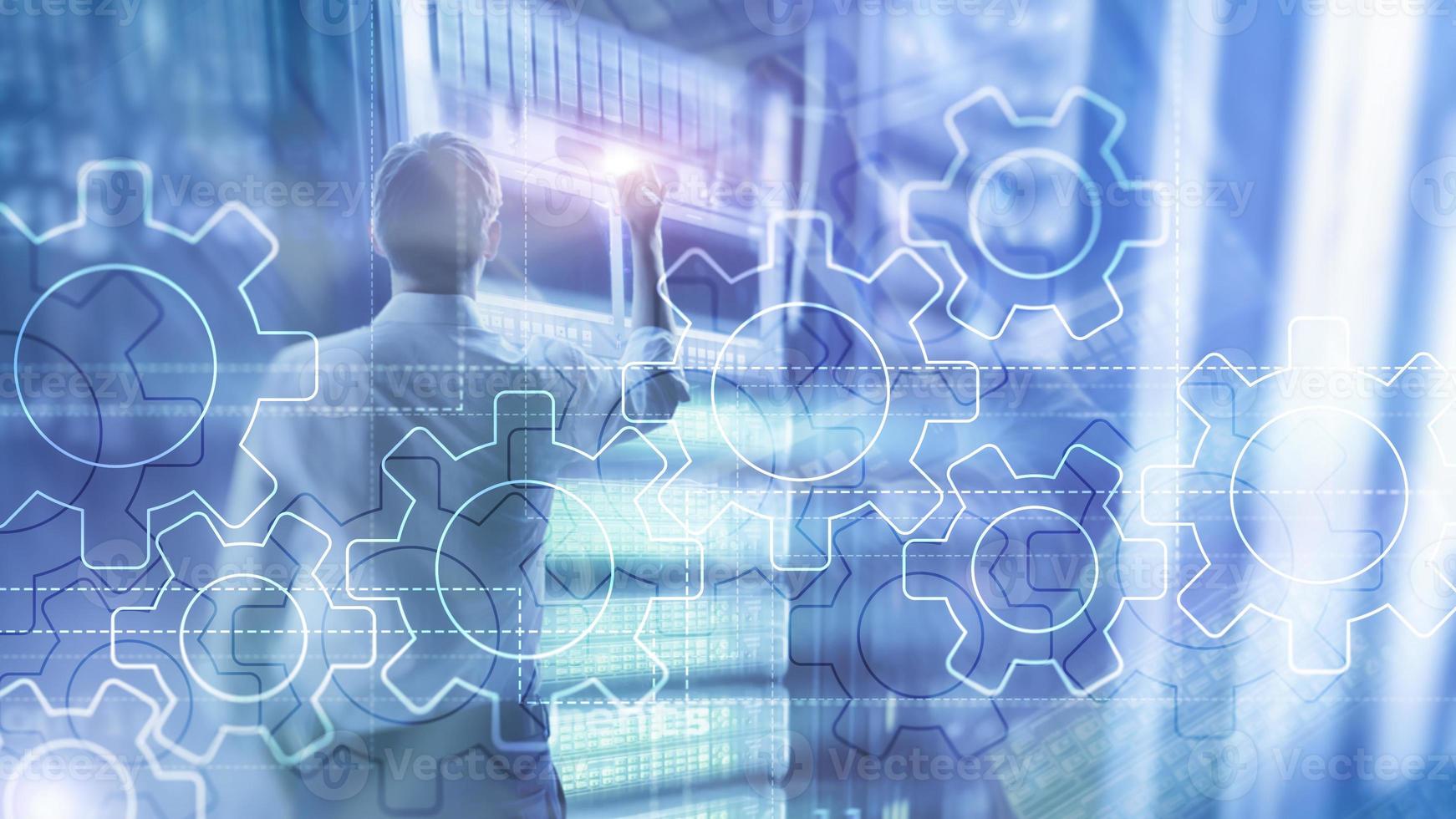 Double exposure gears mechanism on blurred background. Business and industrial process automation concept. photo