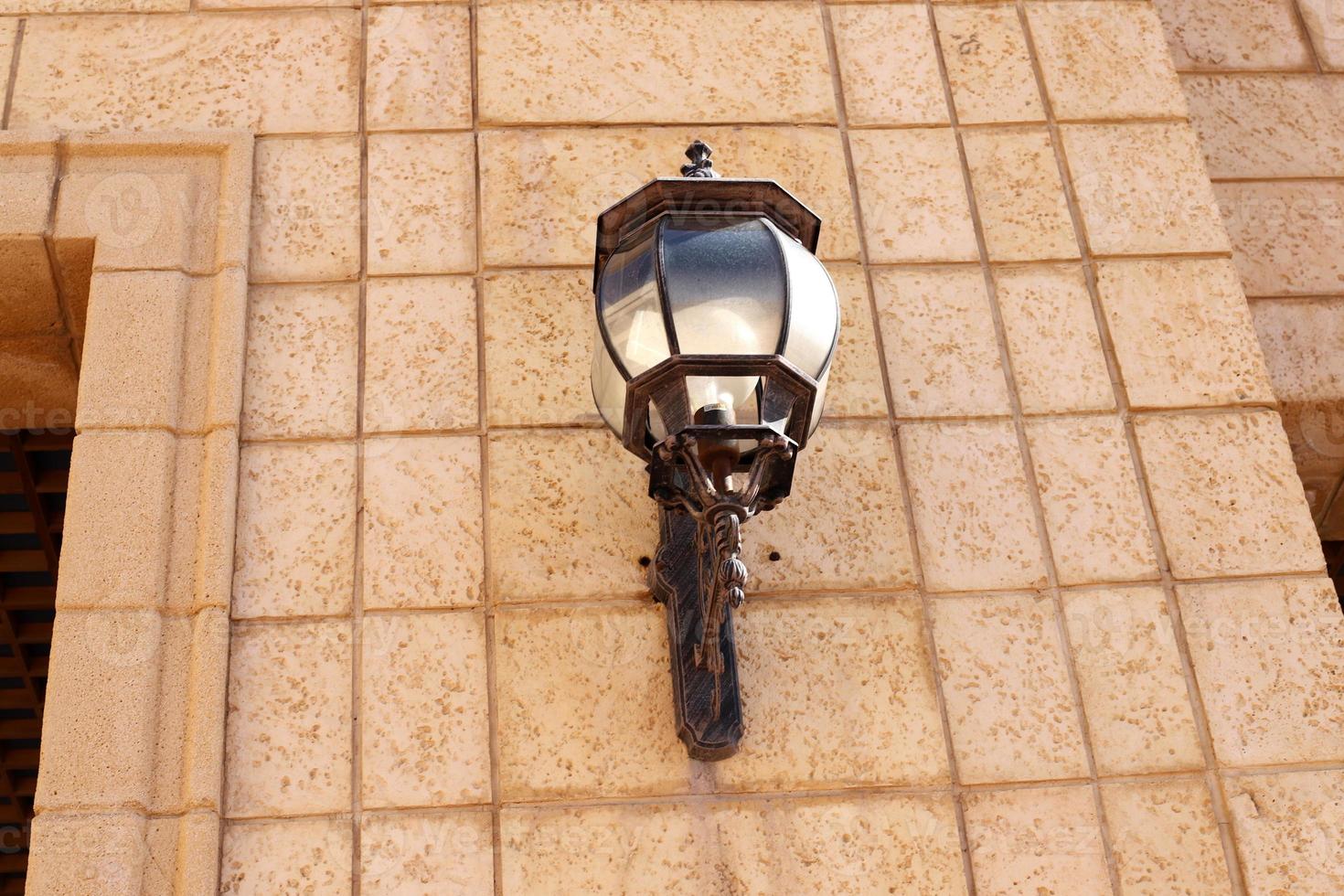 Lantern to illuminate the city street at night. photo