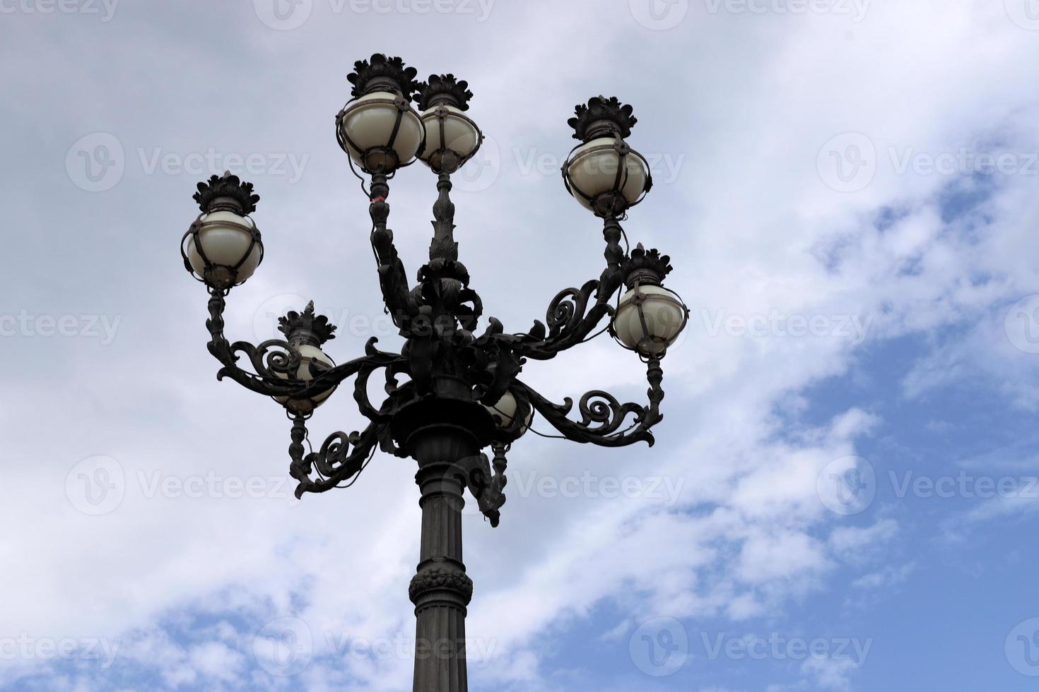 Lantern to illuminate the city street at night. photo