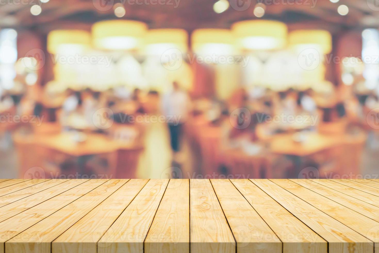 Empty wood table top with cafe restaurant interior blurred background  13014586 Stock Photo at Vecteezy