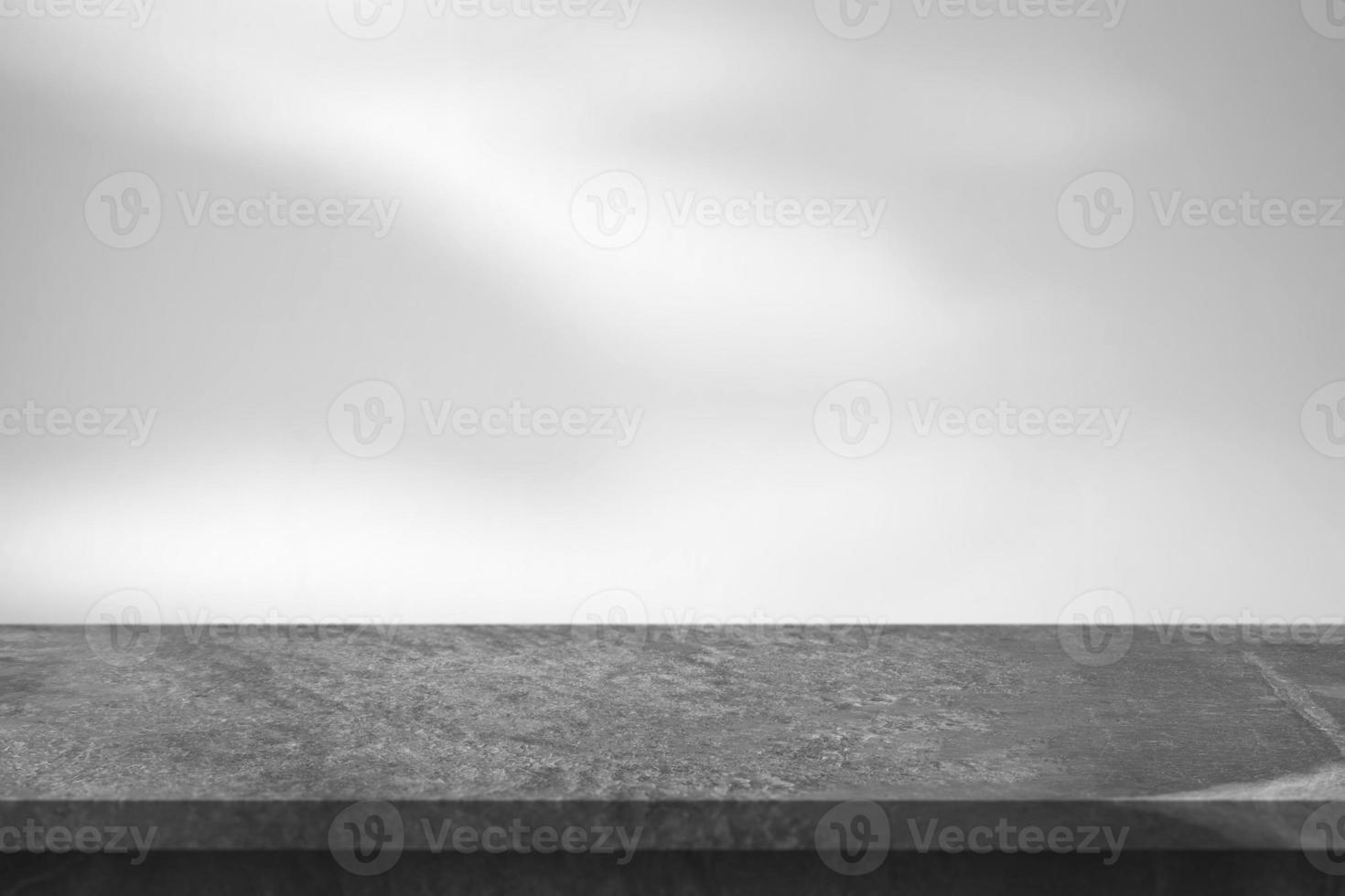 Marble table with tree shadow drop on white wall background for mockup product display photo