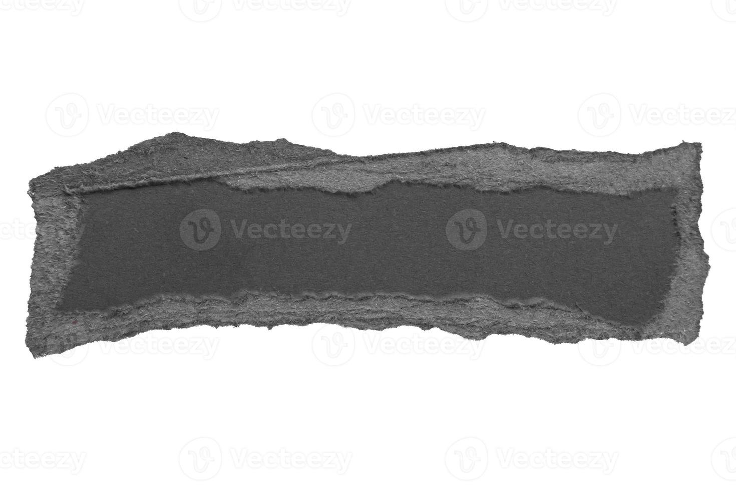 Black ripped paper torn edges strips isolated on white background photo