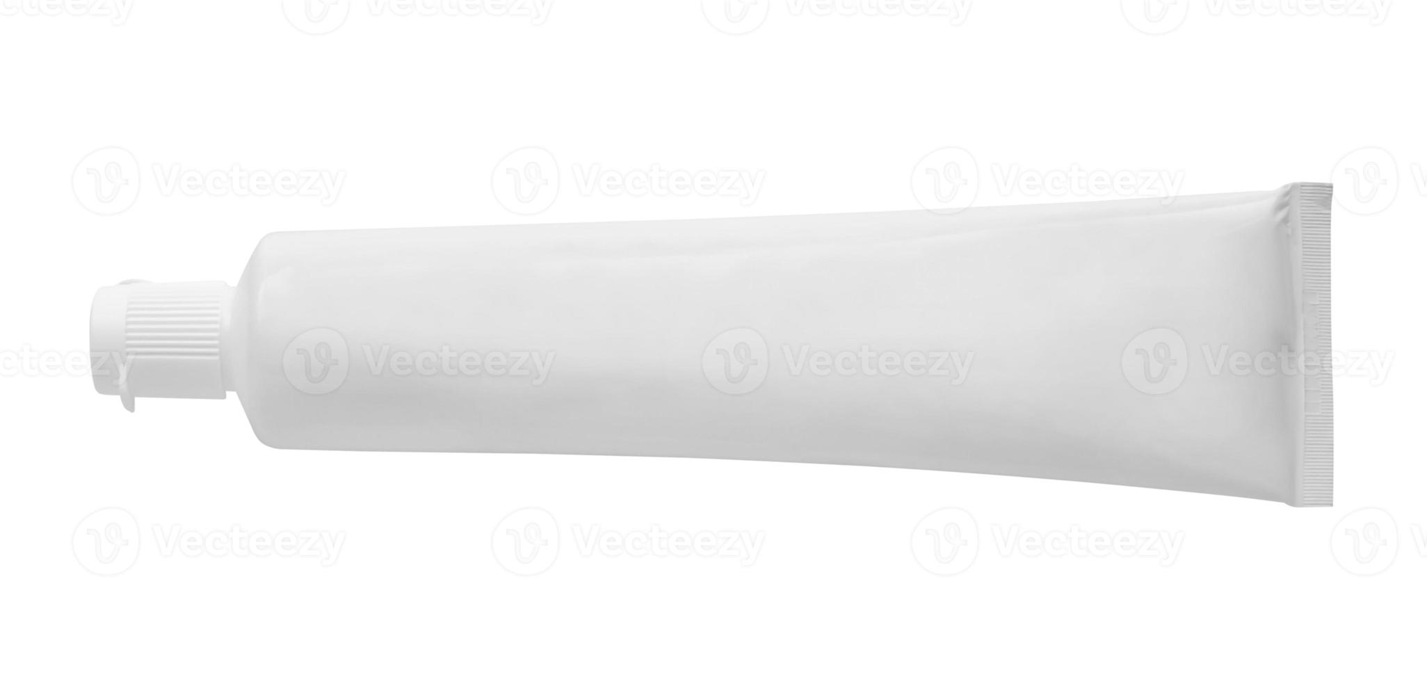 Tubo de pasta de dientes blanco aislado sobre fondo blanco. foto