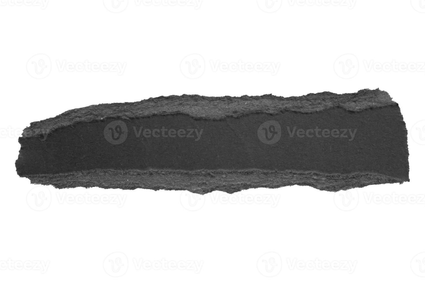 Black ripped paper torn edges strips isolated on white background photo