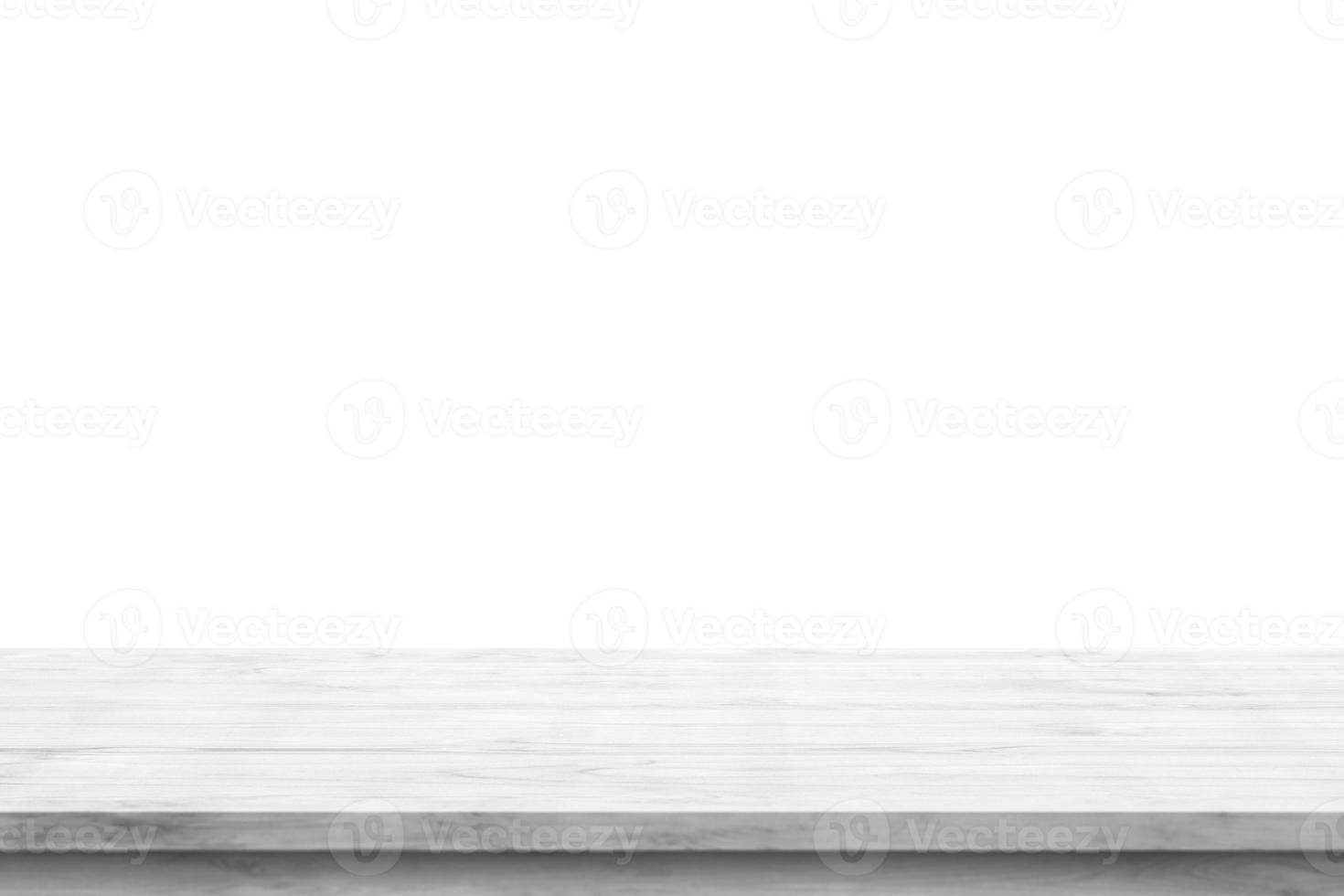 Empty white wooden table top isolated on white background photo