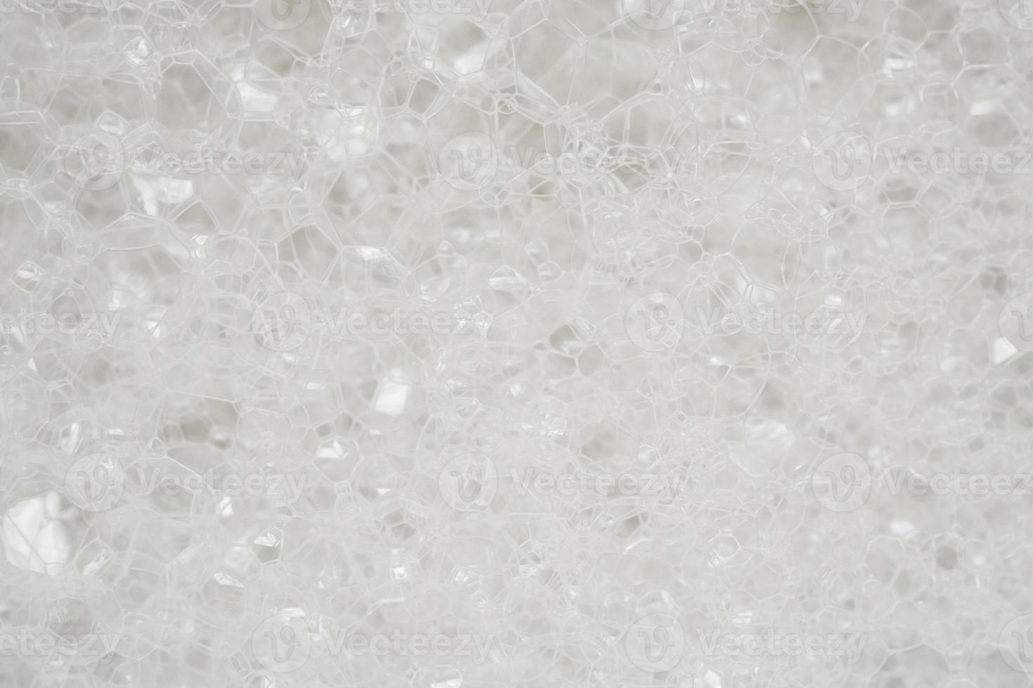 Abstract white soap foam texture background close up photo