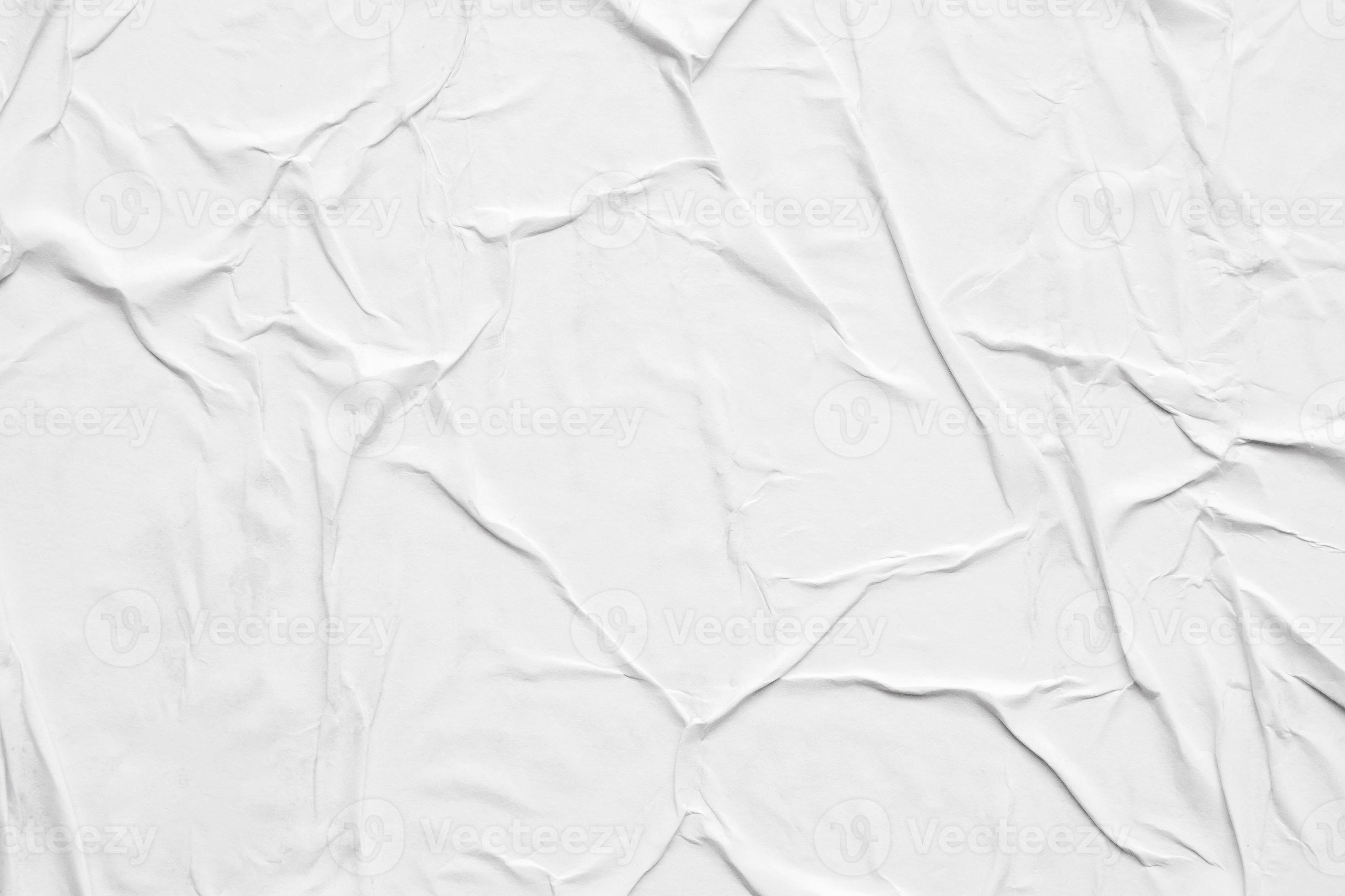 Blank white crumpled and creased paper poster texture background