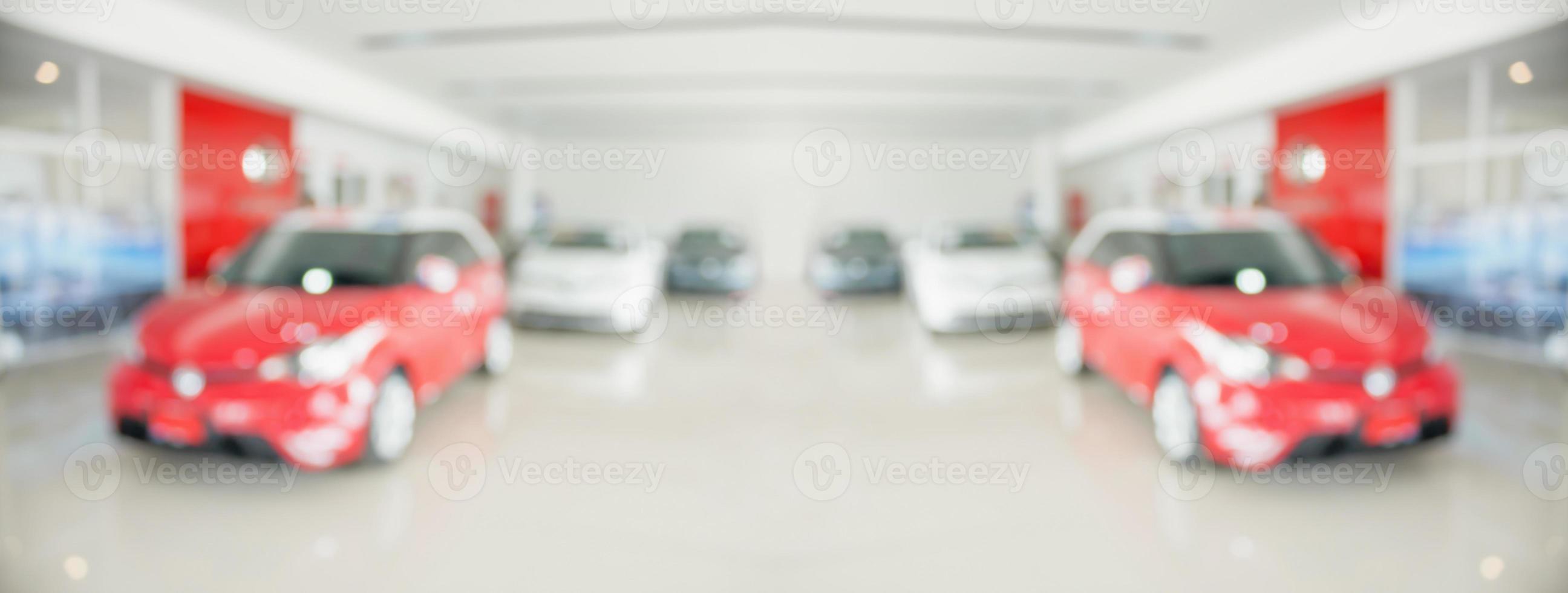 new cars in showroom interior blurred abstract background photo