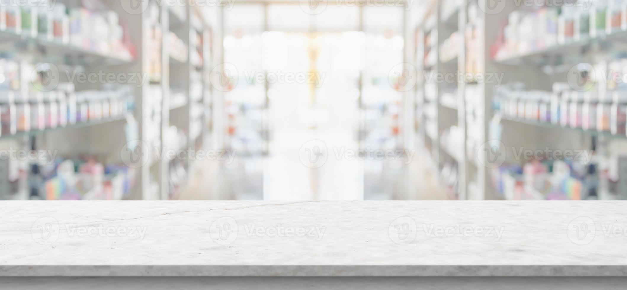 Empty white marble counter top with blur pharmacy drugstore shelves background photo