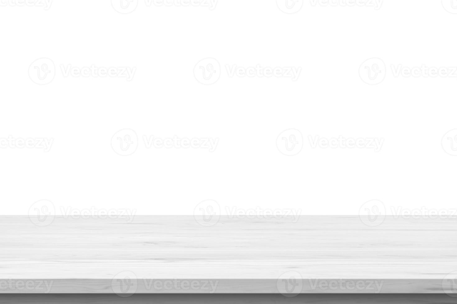 Empty white wooden table top isolated on white background photo