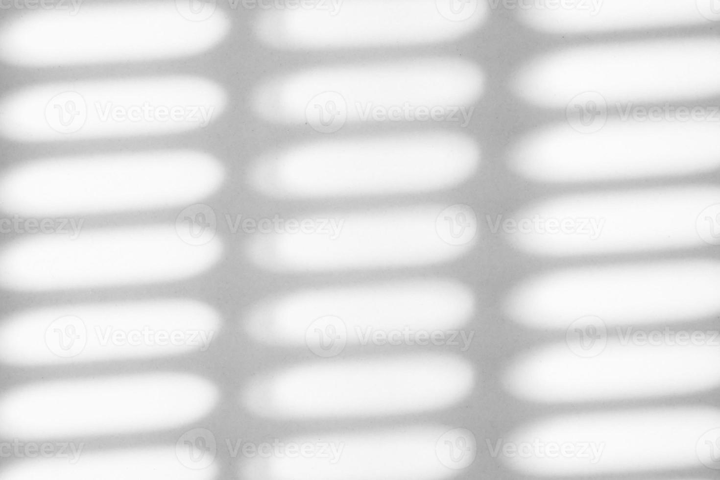 Abstract shadow drop on white wall background photo