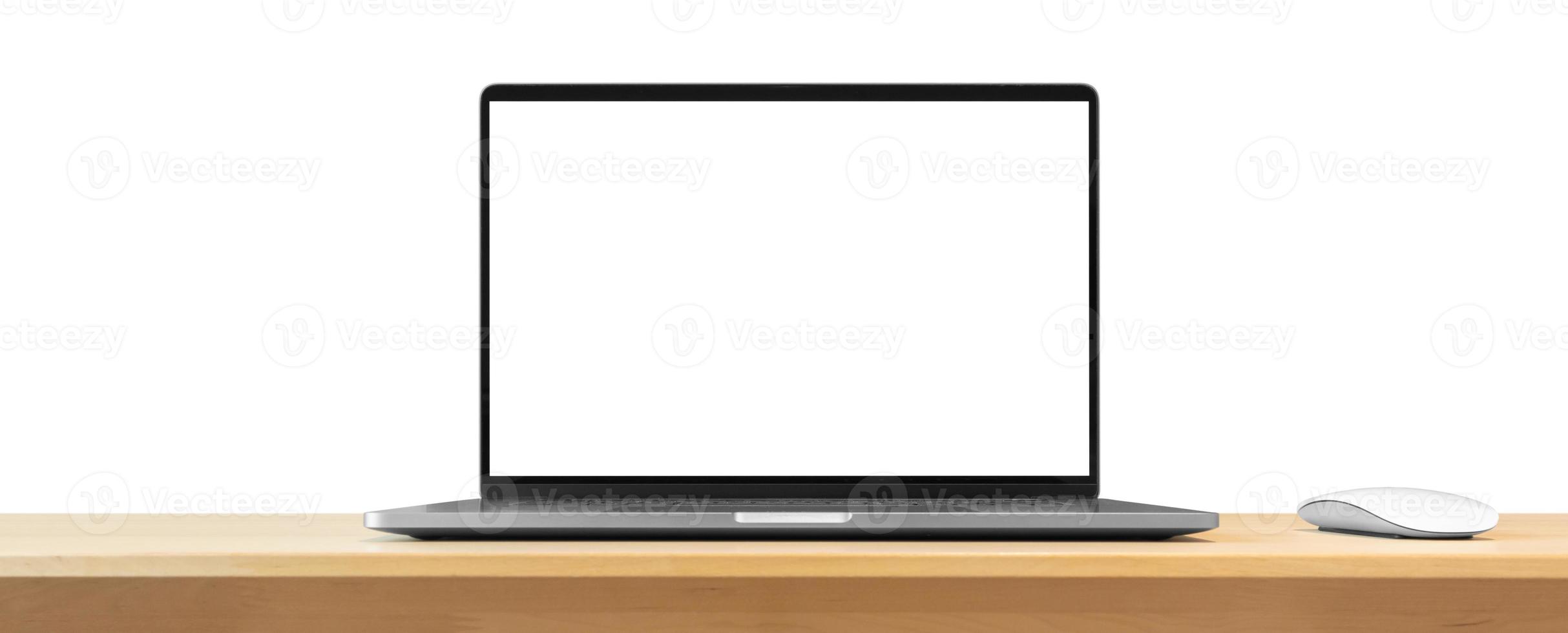 Laptop with blank screen on wood table isolated on white background photo