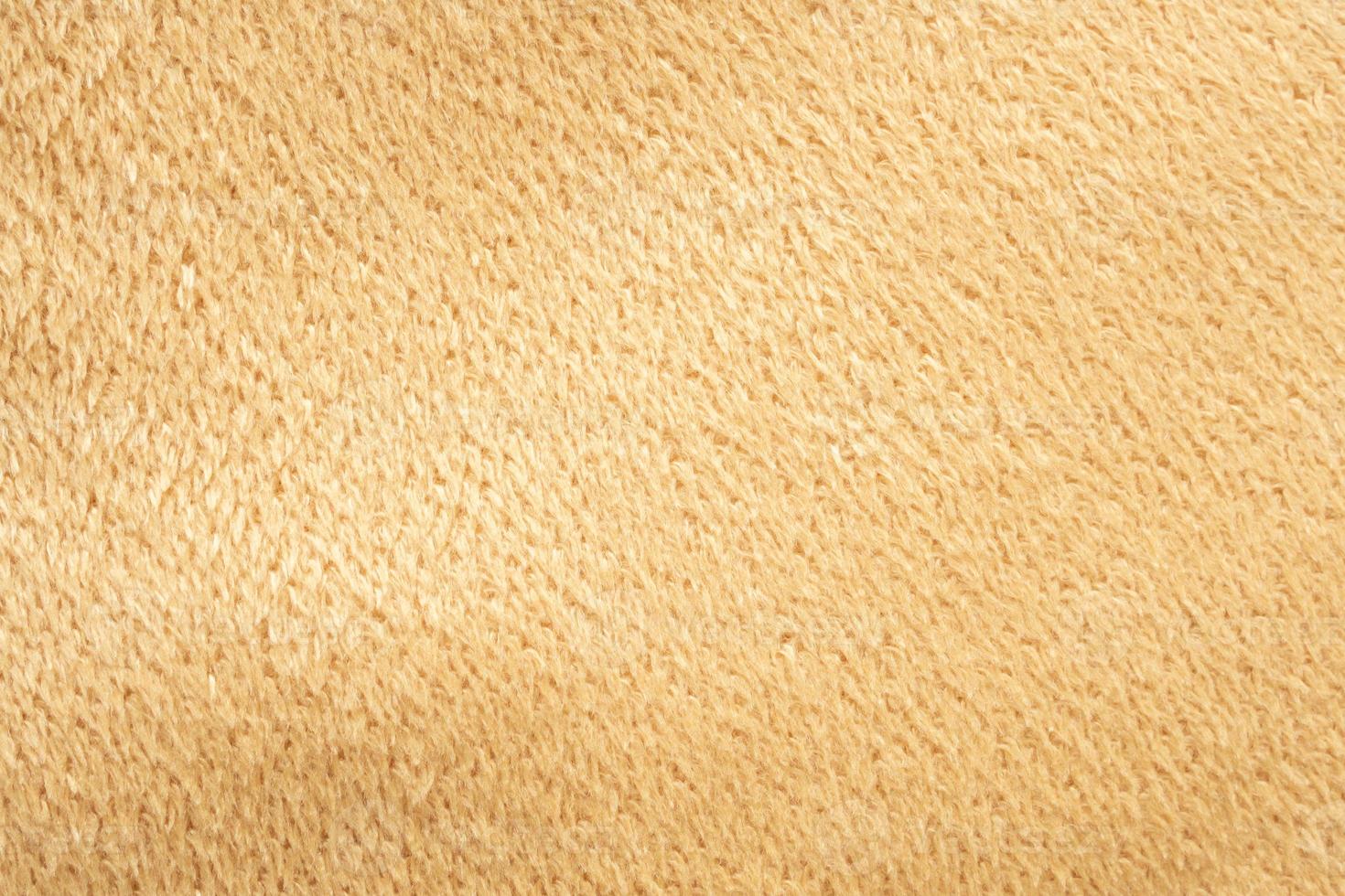 yellow fluffy fur fabric wool texture background photo