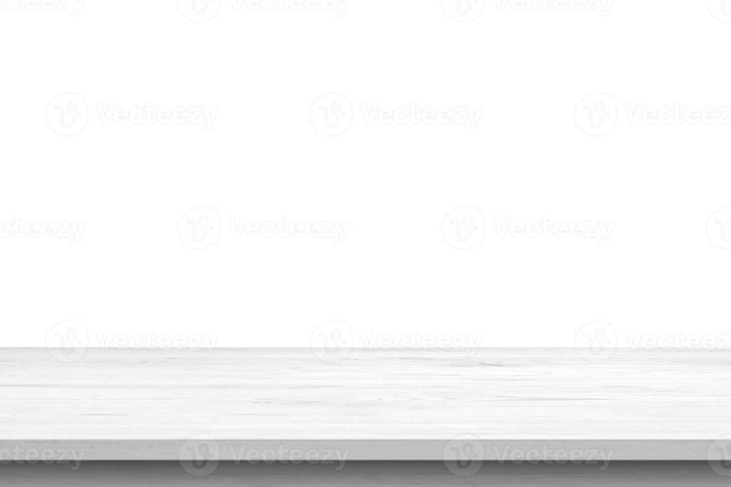Empty white wooden table top isolated on white background photo