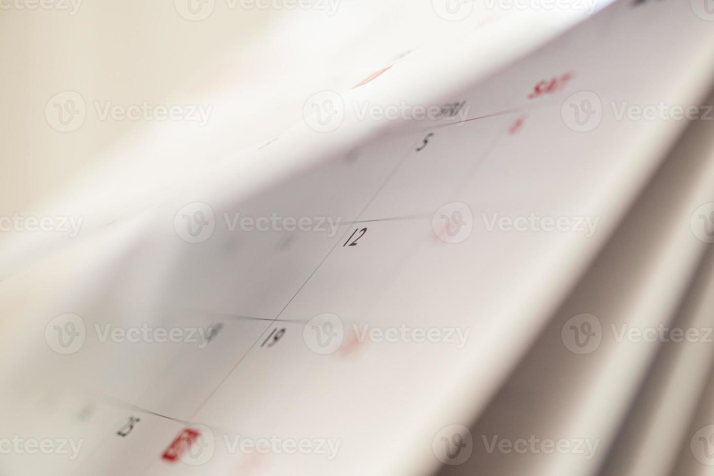 Abstract blur calendar page flipping sheet close up background business schedule planning appointment meeting concept photo