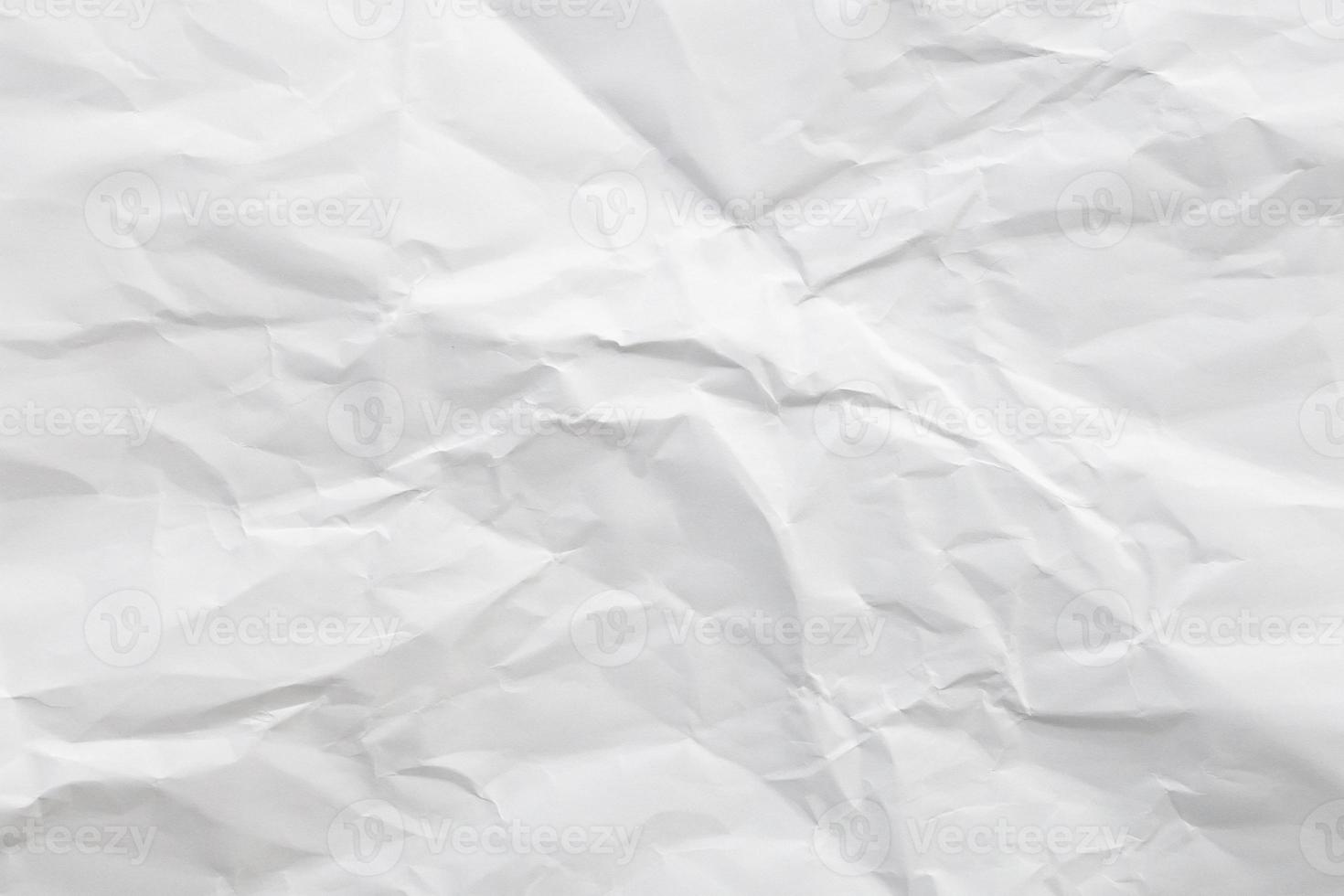 White crumpled and creased paper texture background photo
