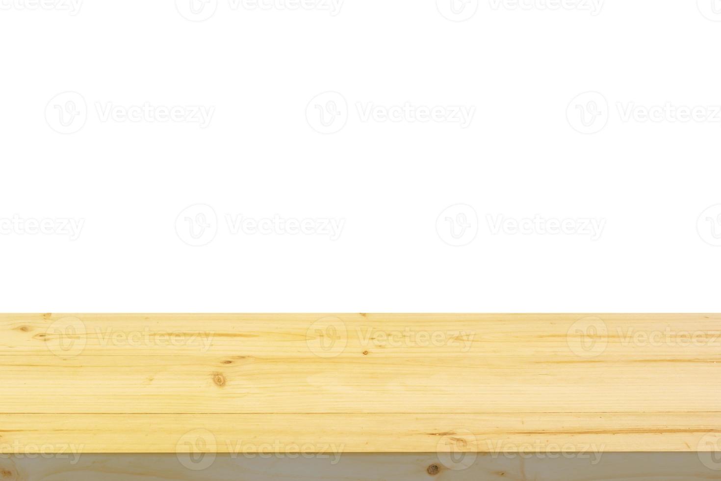 Empty wooden table top isolated on white background for montage product display photo