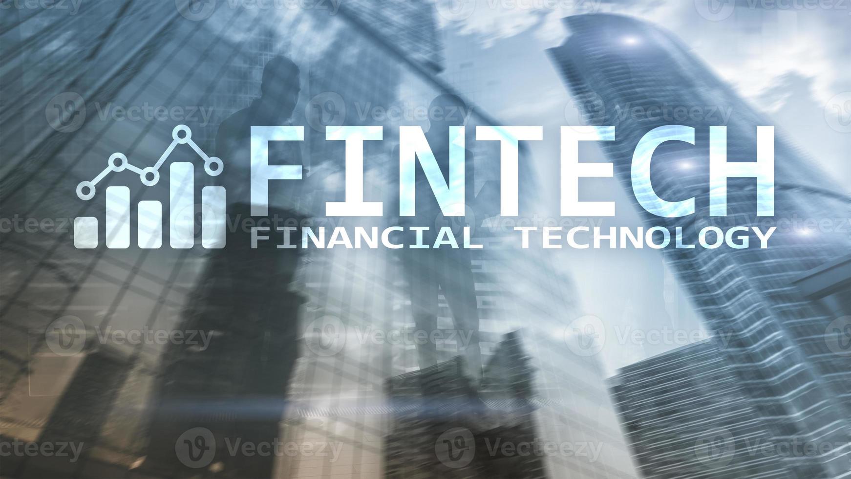 FINTECH - Financial technology, global business and information Internet communication technology. Skyscrapers background. Hi-tech business concept photo