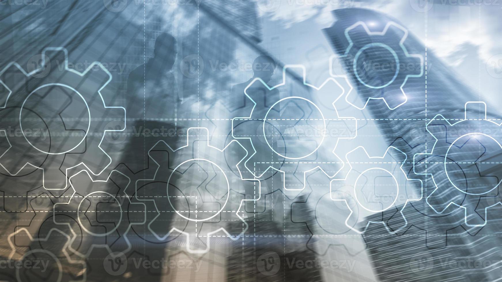 Double exposure gears mechanism on blurred background. Business and industrial process automation concept photo