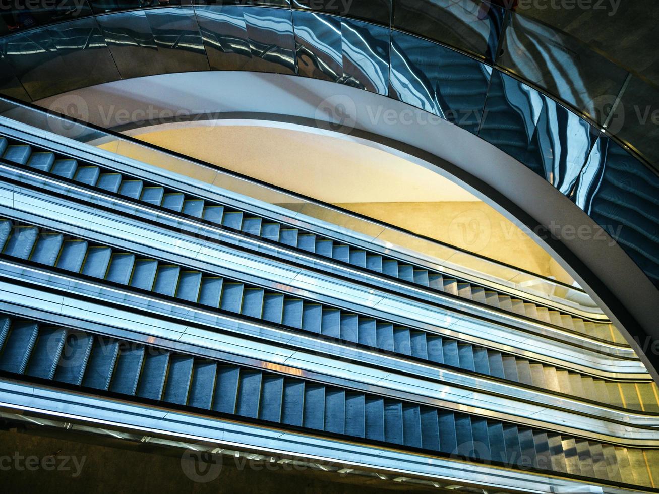 High angle view of escalators in a circular atrium photo