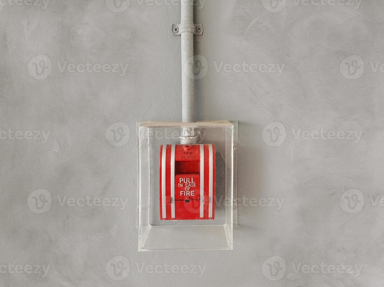 Fire alarm box on cement wall for alarm and security system photo