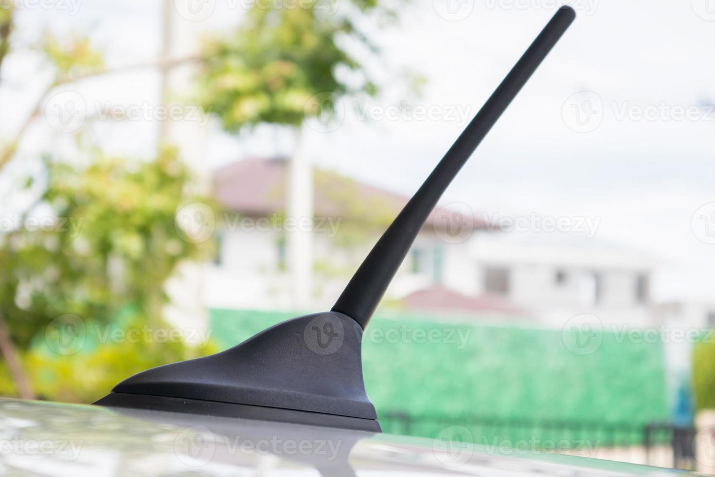 car radio antenna on the car roof photo