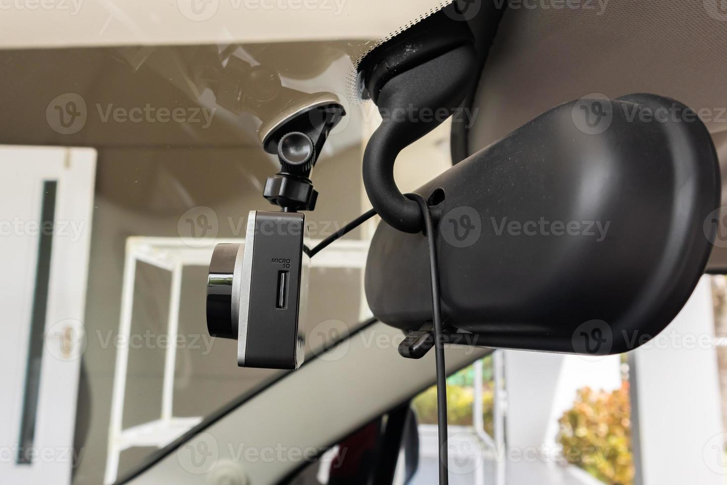 Car CCTV camera video recorder for driving safety on the road photo