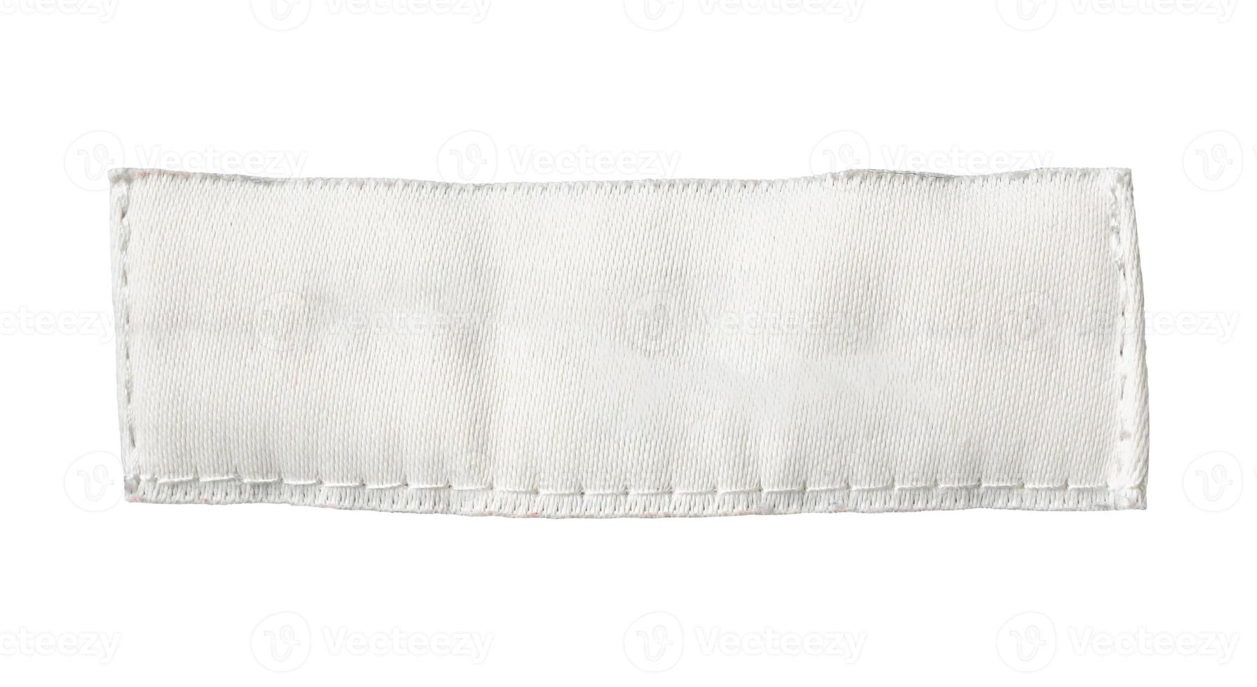 White blank clothing tag label isolated on white background photo