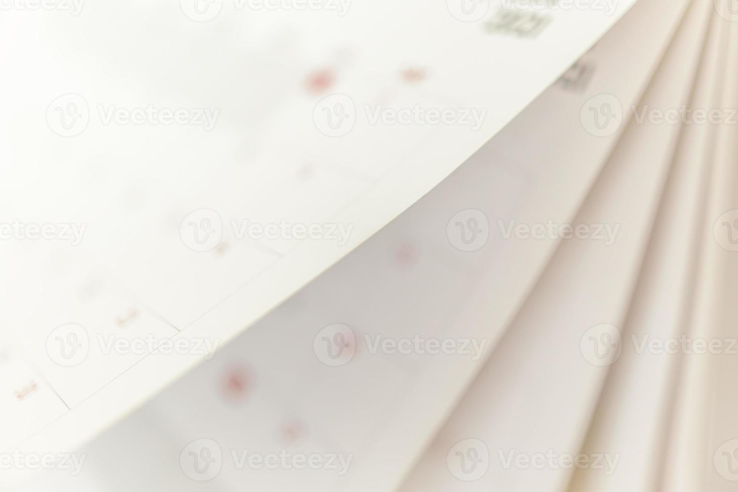 Abstract blur calendar page flipping sheet background business schedule planning appointment meeting concept photo