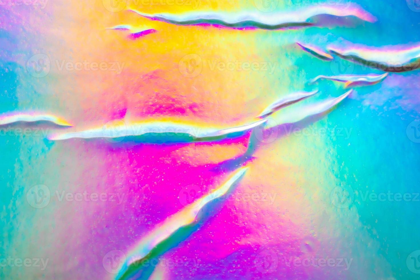 Crumpled Holographic rainbow foil iridescent texture abstract hologram background photo