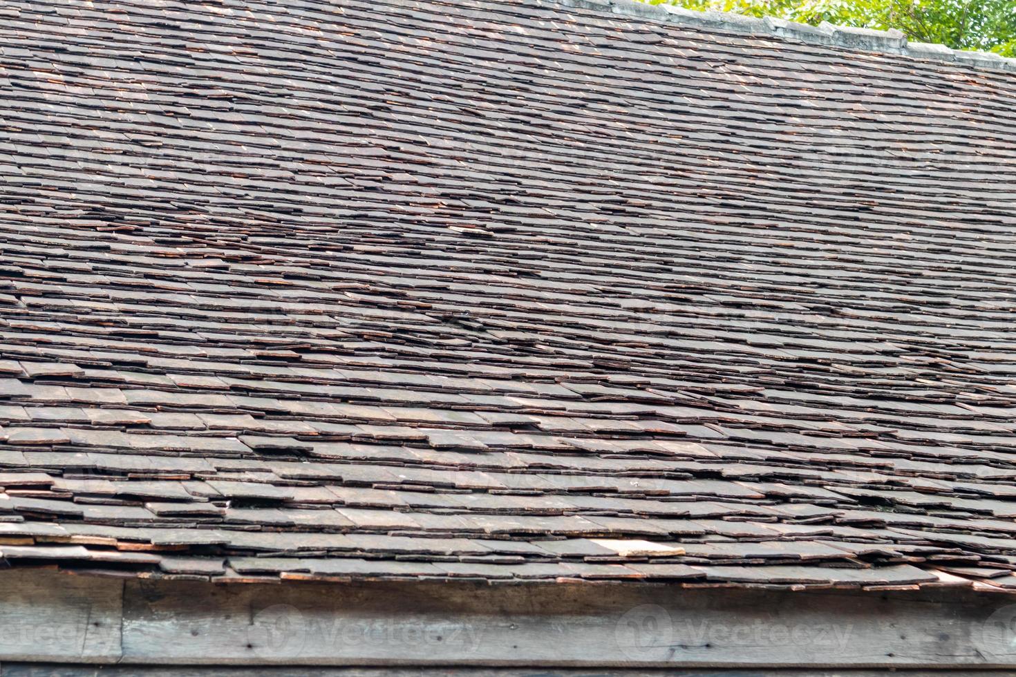 old roof tiles on the house photo