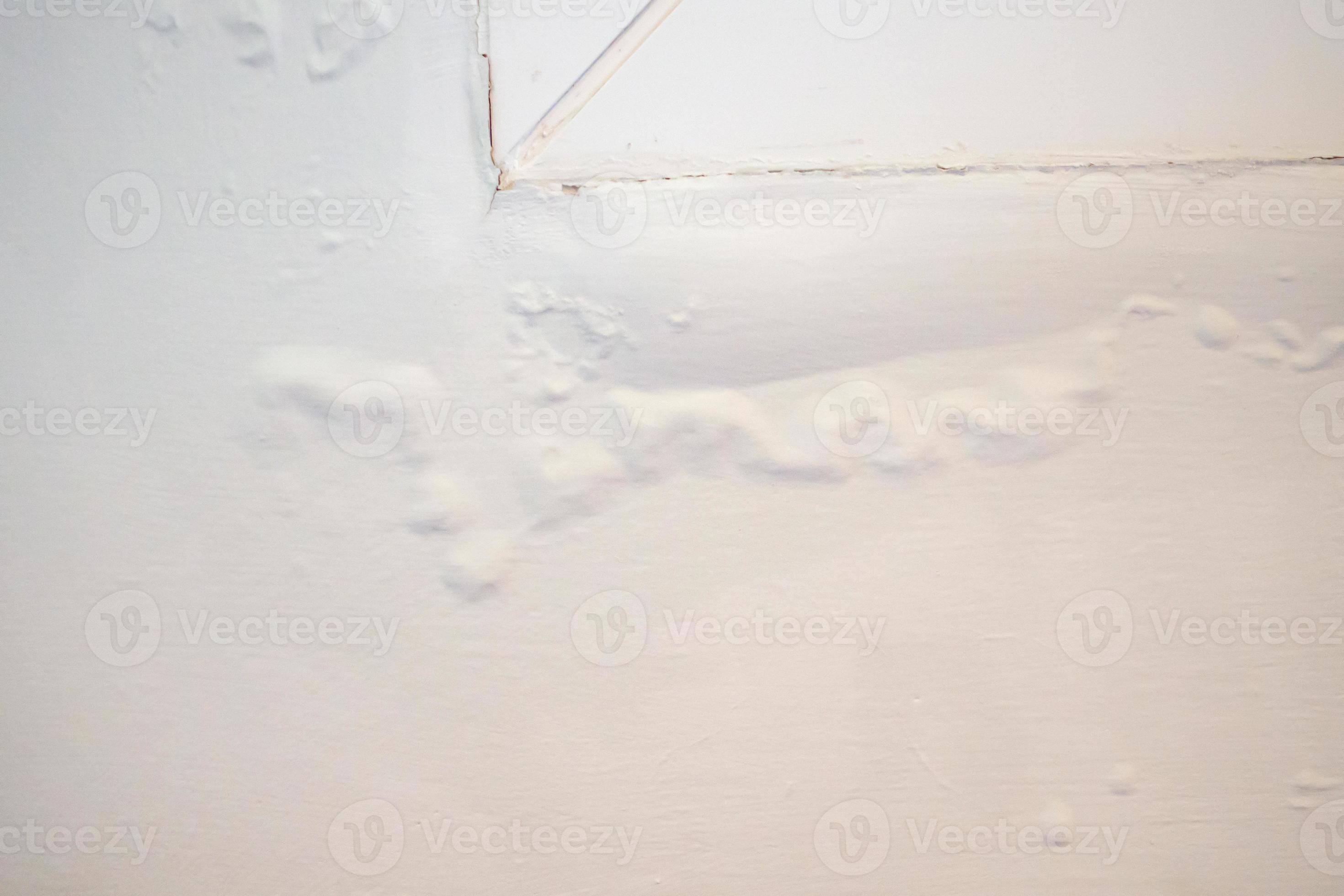 house wall near the window with some water stain show peeling paint 13027555 Stock Photo at Vecteezy