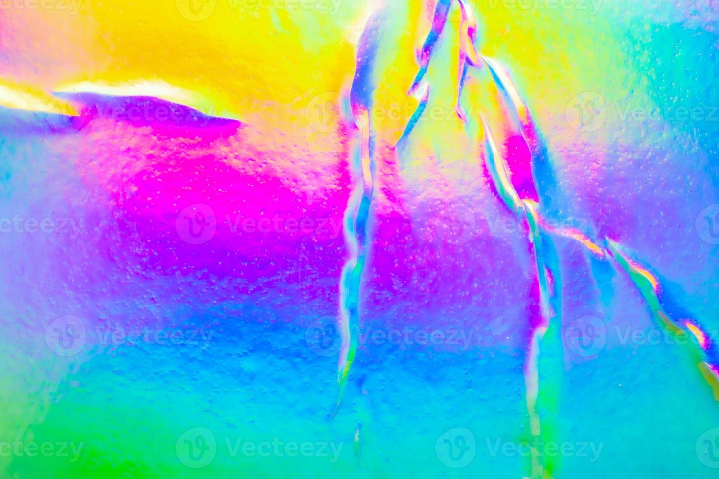 Crumpled Holographic rainbow foil iridescent texture abstract hologram background photo