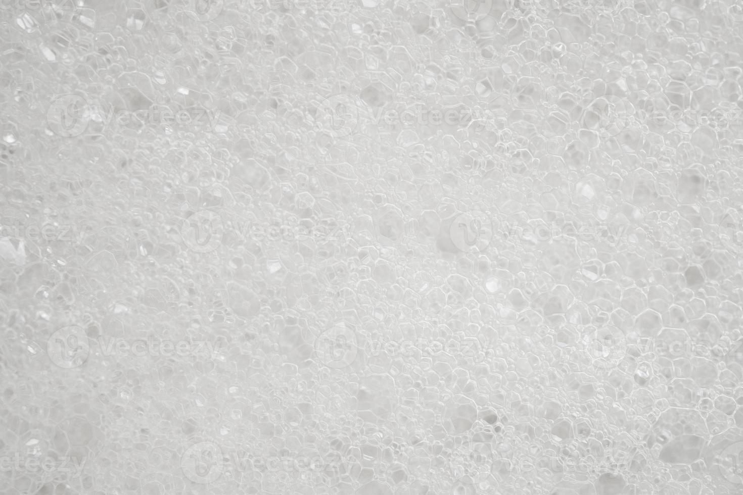 Abstract white soap foam texture background close up photo