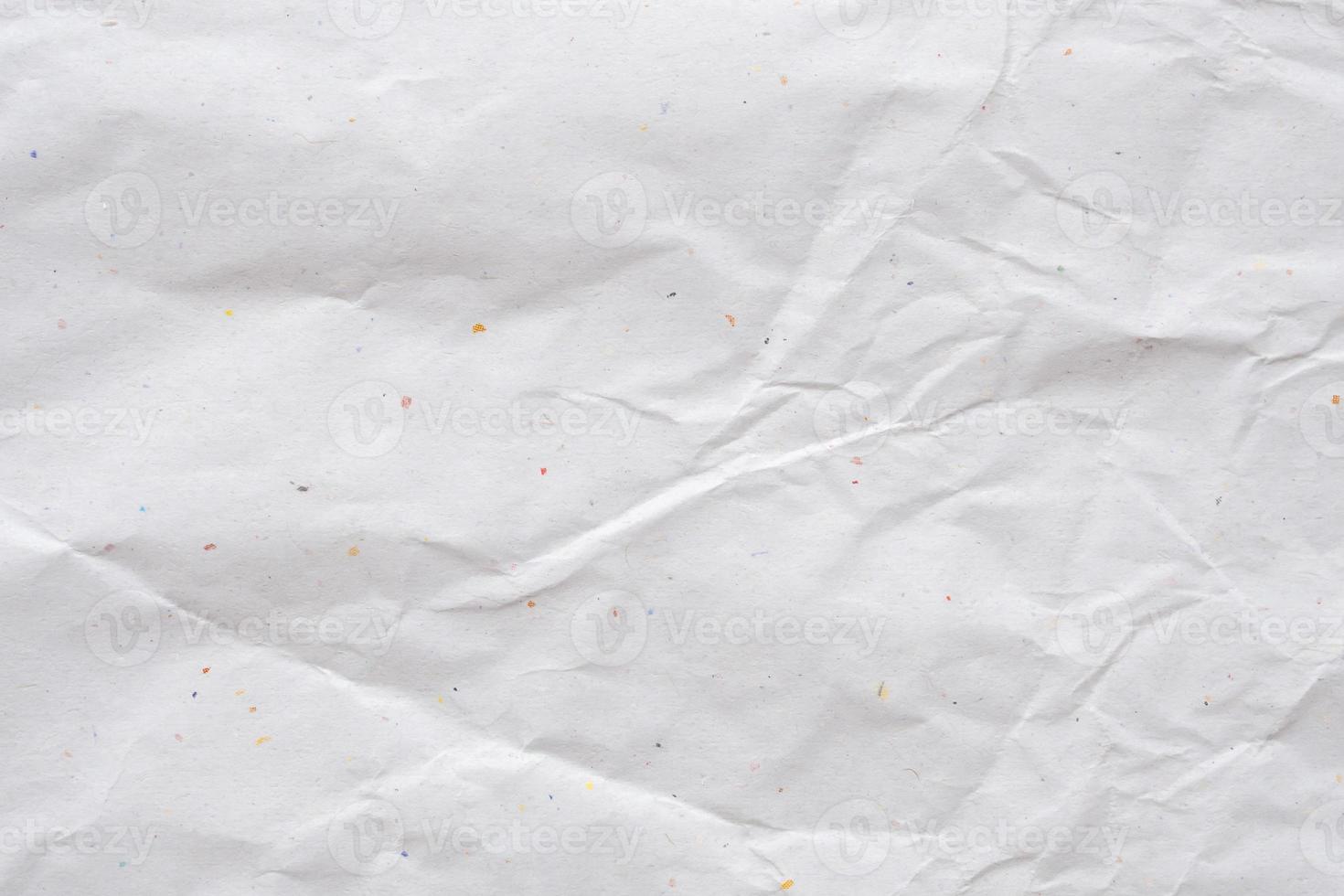 white crumpled and creased recycle paper texture background photo