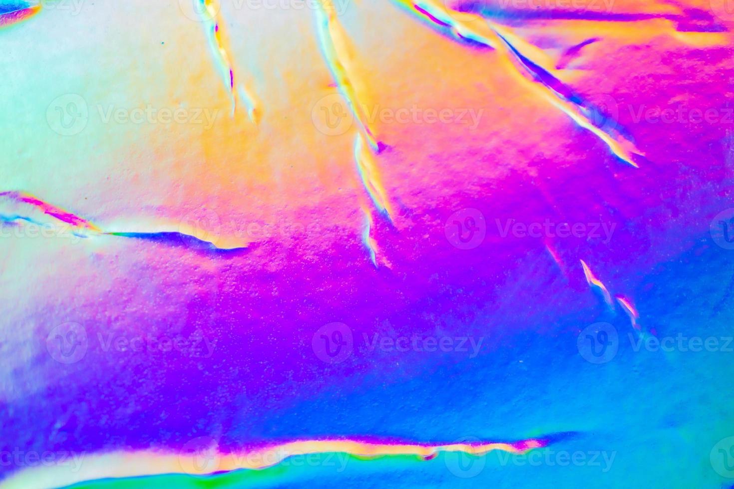 Crumpled Holographic rainbow foil iridescent texture abstract hologram background photo