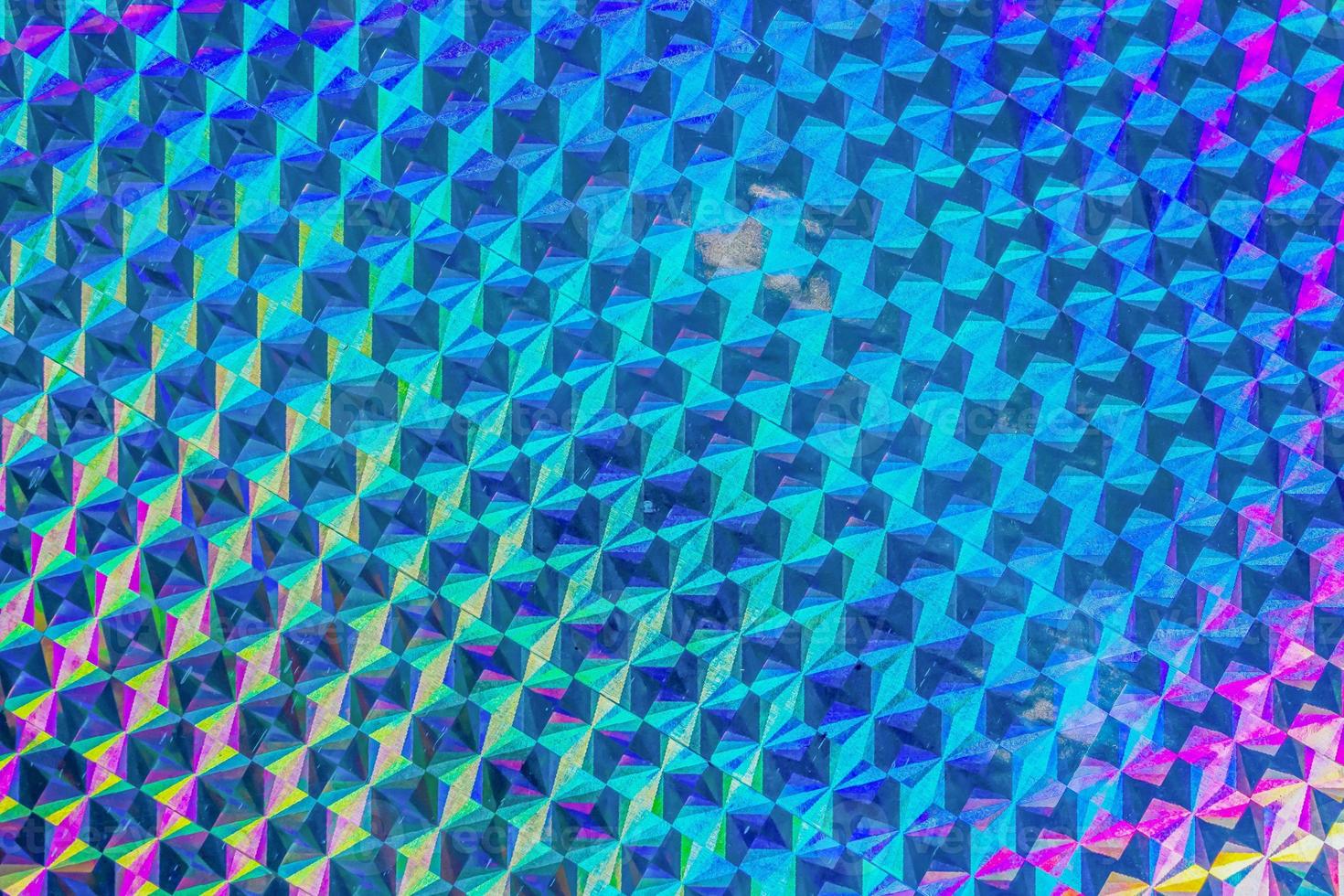 Holographic rainbow foil iridescent texture abstract hologram background photo