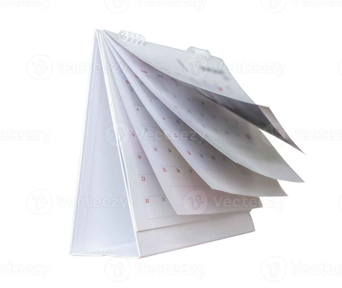 White paper desk calendar flipping page mockup isolated on white background photo