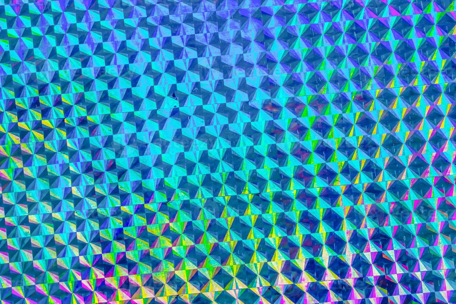 Holographic rainbow foil iridescent texture abstract hologram background photo