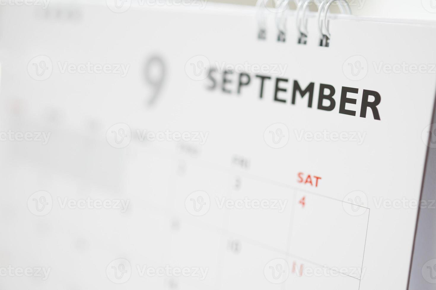 September calendar page with months and dates business planning appointment meeting concept photo