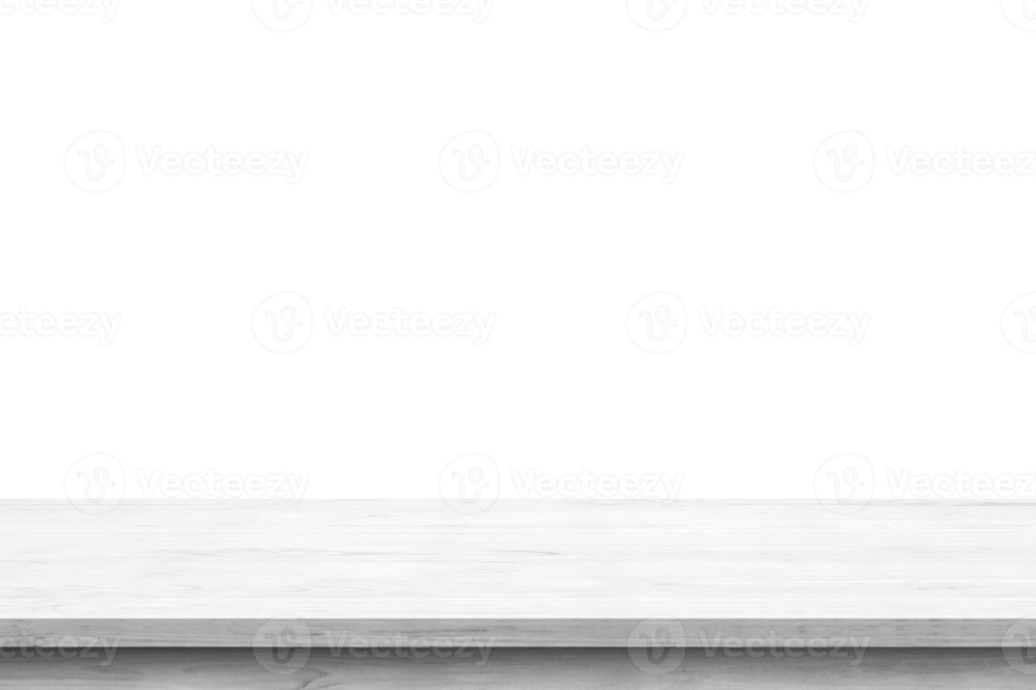 Empty white wooden table top isolated on white background photo