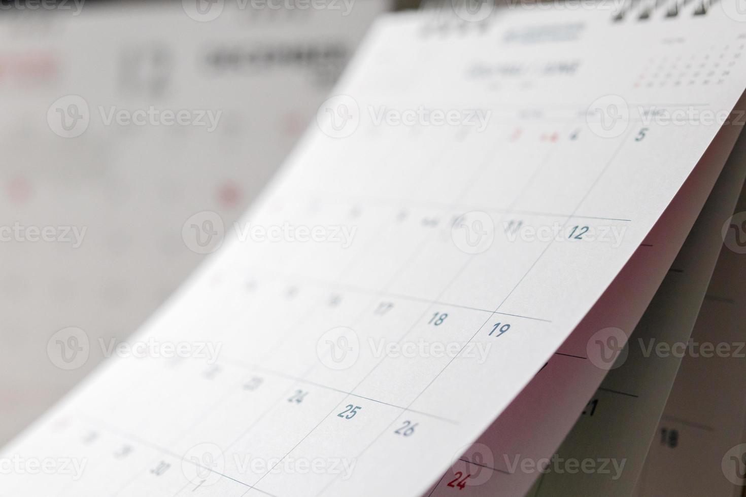 Abstract blur calendar page flipping sheet close up background business schedule planning appointment meeting concept photo