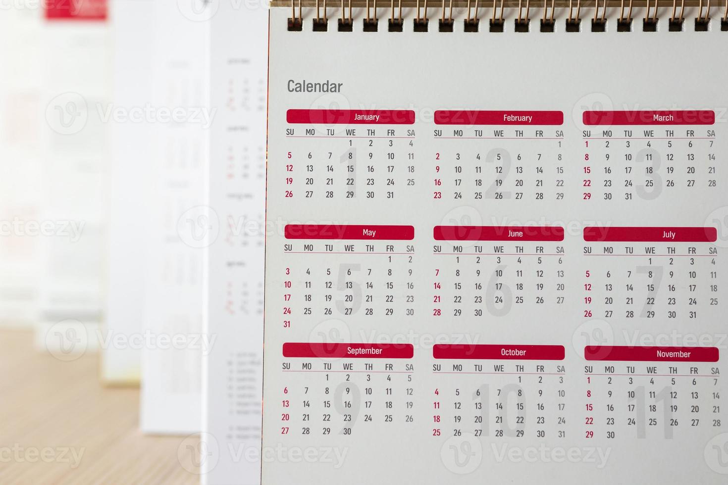 Close up calendar page dates and month background business planning appointment meeting concept photo