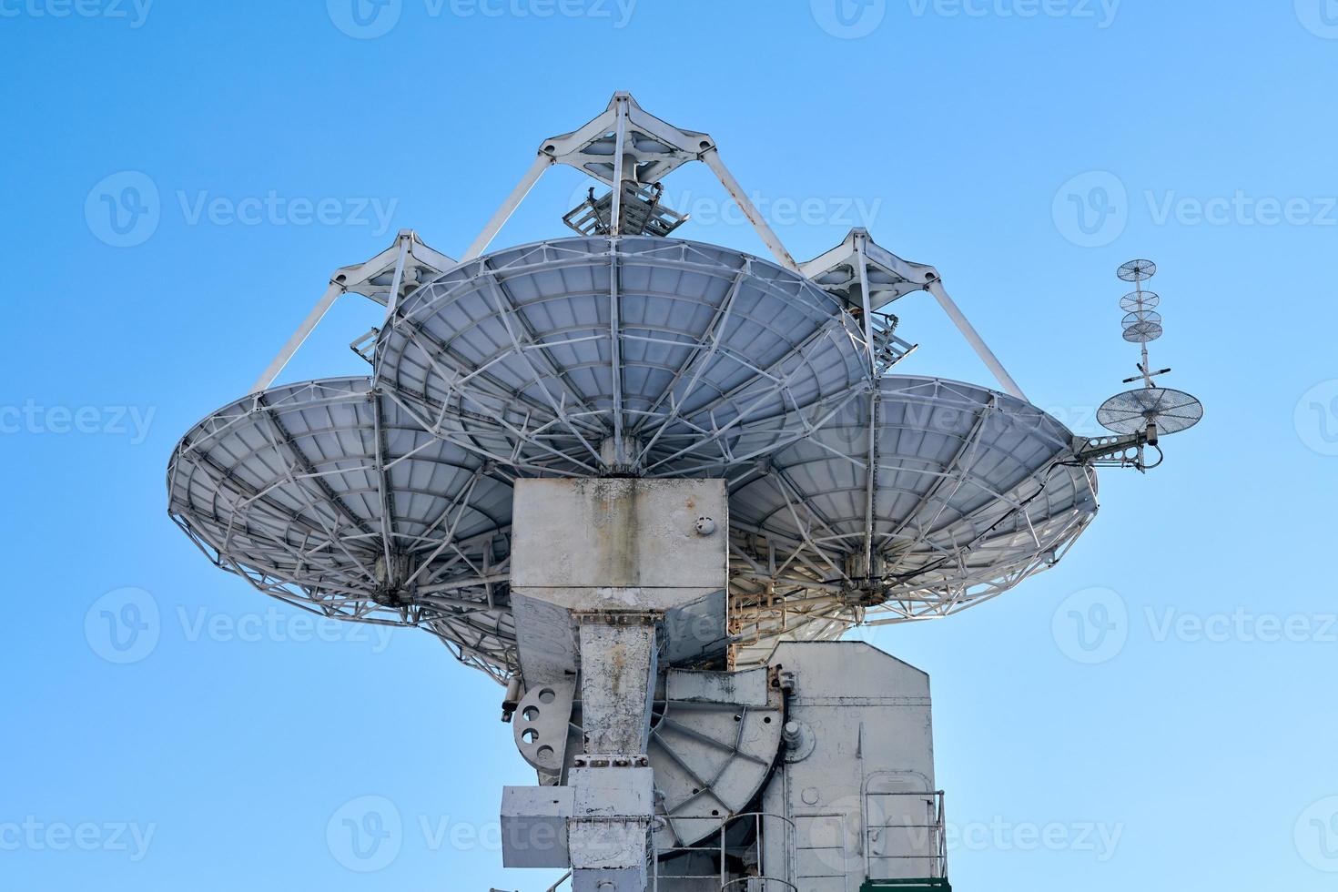 Mast of ship with navigation equipment, bottom view photo