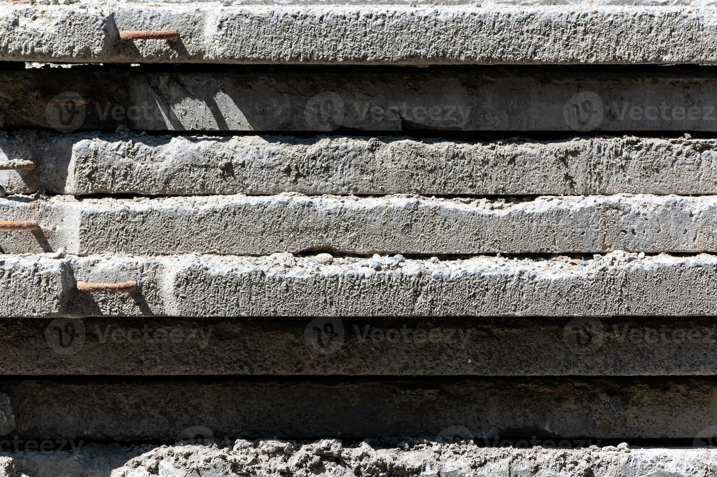 Concrete slabs for building new modern business center. Pattern of concrete plates at construction site. photo