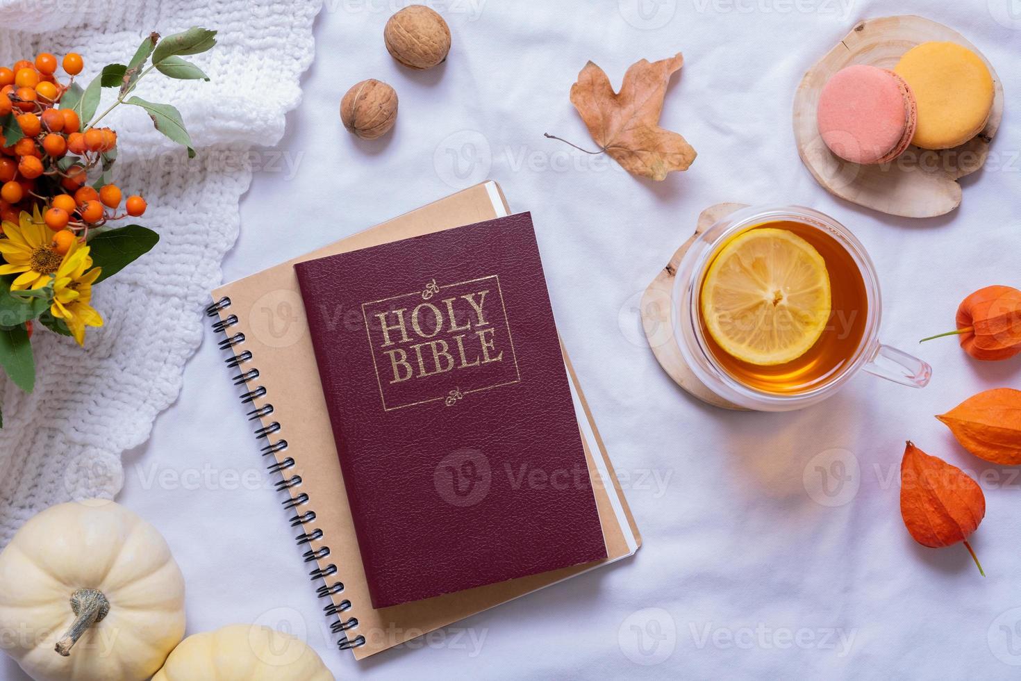 Holy Bible and autumn cozy decor top view. Bible study fall concept photo