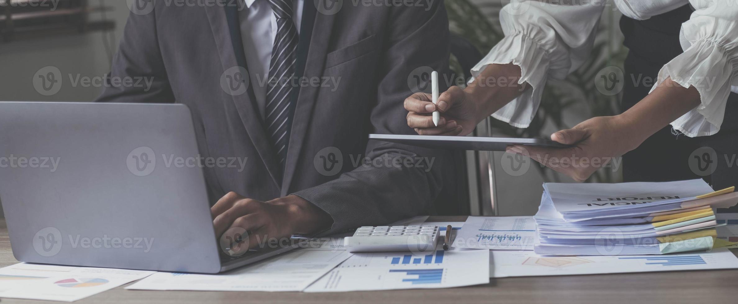 Asian business adviser meeting to analyze and discuss the situation on the financial report in the meeting room.Investment Consultant, Financial advisor and accounting concept photo